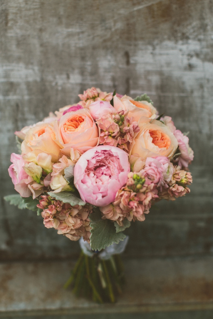 A Yellow and Peach Minnesota Farm Wedding via TheELD.com