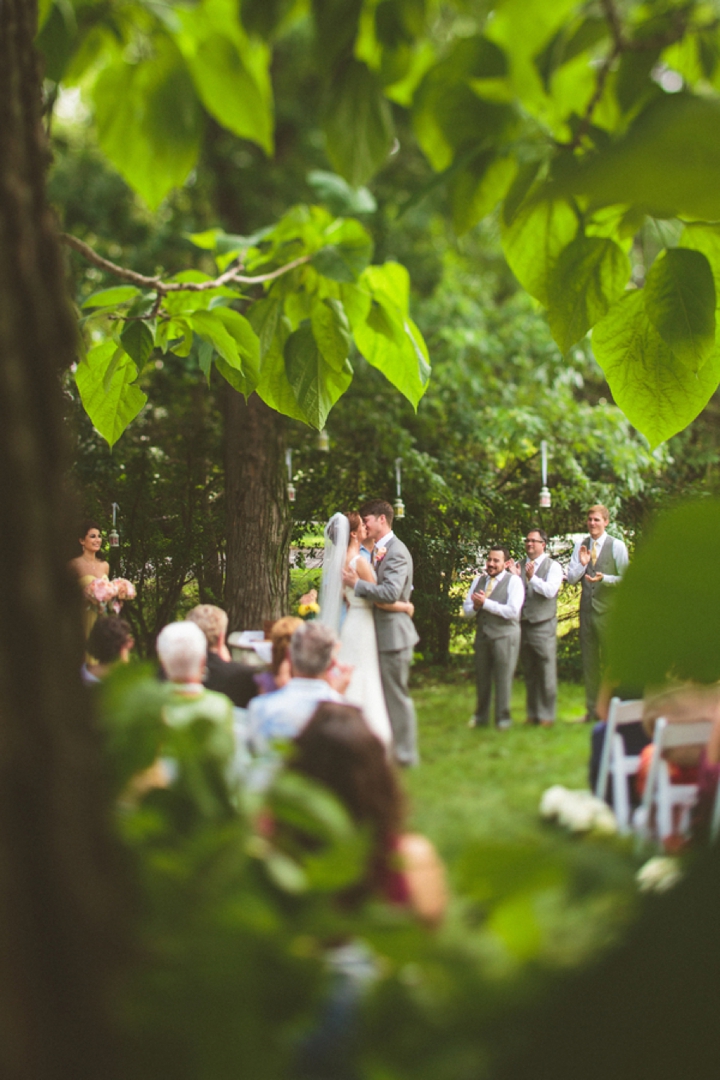 A Yellow and Peach Minnesota Farm Wedding via TheELD.com