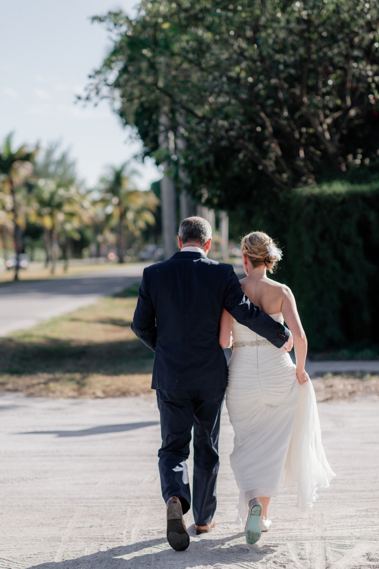 A Chic Oceanside Coral Wedding via TheELD.com