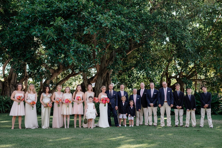 A Chic Oceanside Coral Wedding via TheELD.com