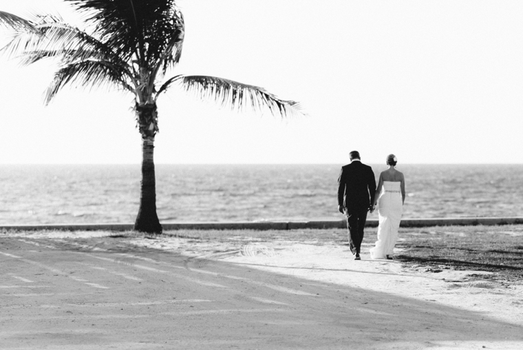 A Chic Oceanside Coral Wedding via TheELD.com