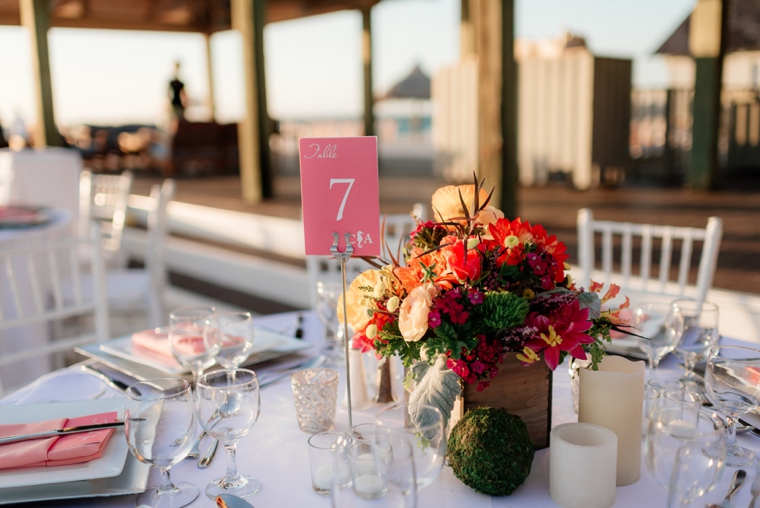 A Chic Oceanside Coral Wedding via TheELD.com