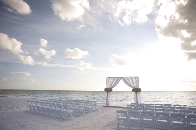 A Glamorous Silver & Blush Beach Wedding via TheELD.com