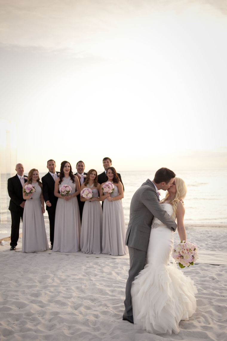 A Glamorous Silver & Blush Beach Wedding via TheELD.com