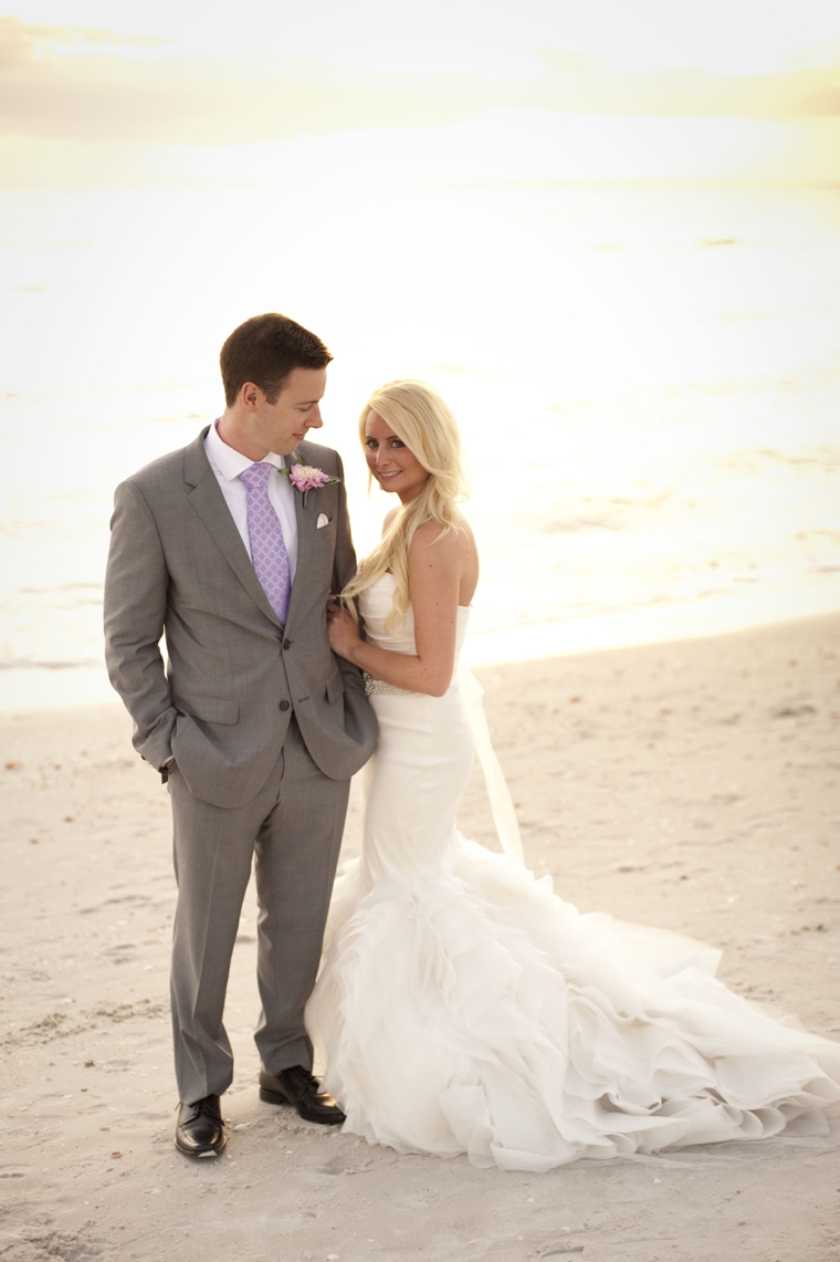 A Glamorous Silver & Blush Beach Wedding via TheELD.com