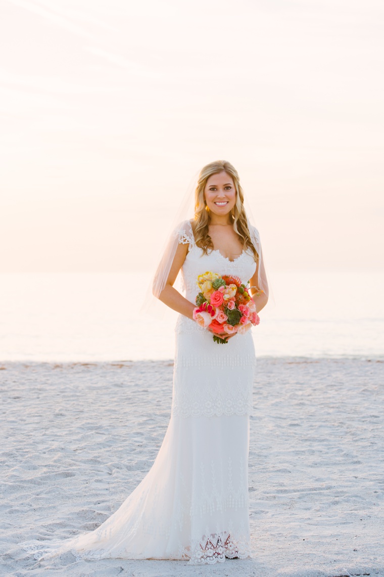 Eclectic Aqua and Coral Beach Wedding  via TheELD.com