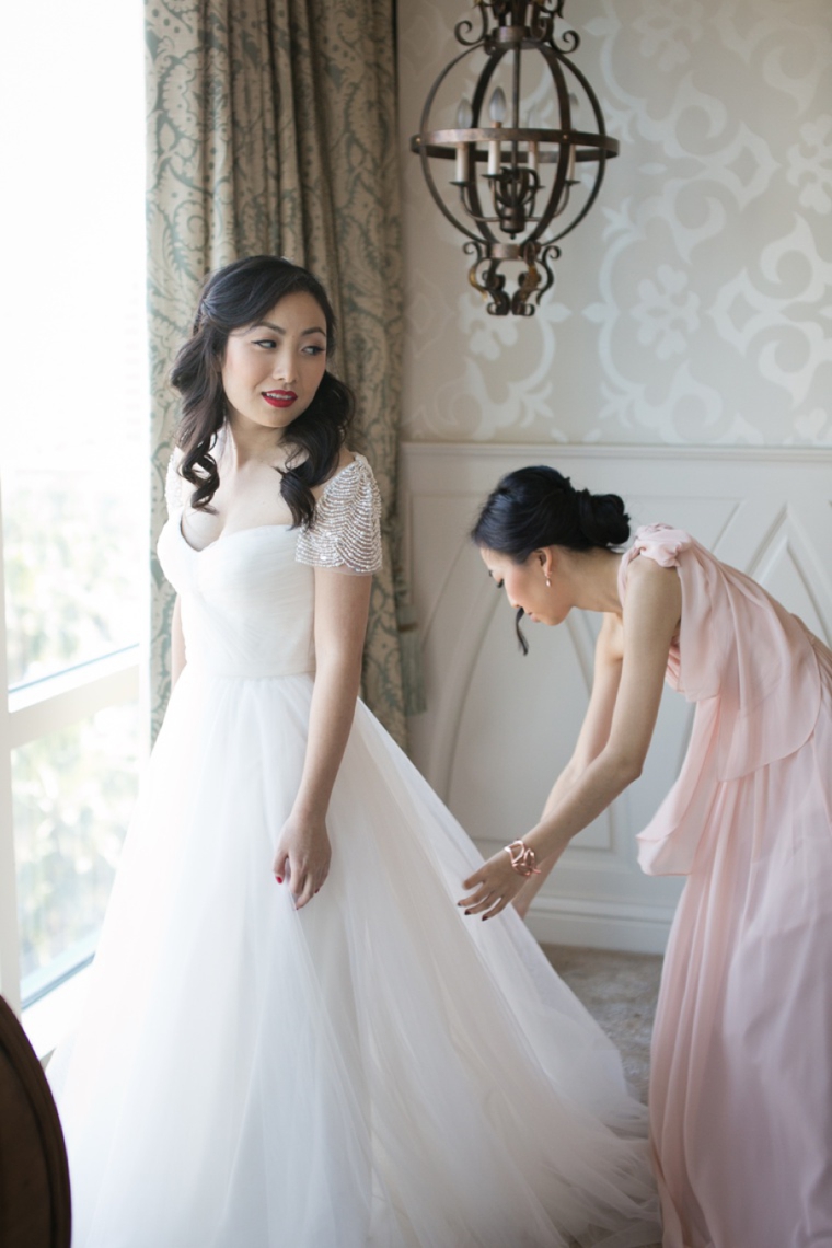 Aqua, Pink & Gold Disneyland Wedding  via TheELD.com