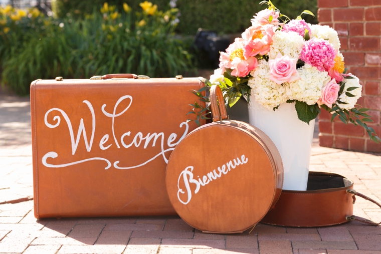 Pink & Orange Vintage Travel Themed Wedding via TheELD.com