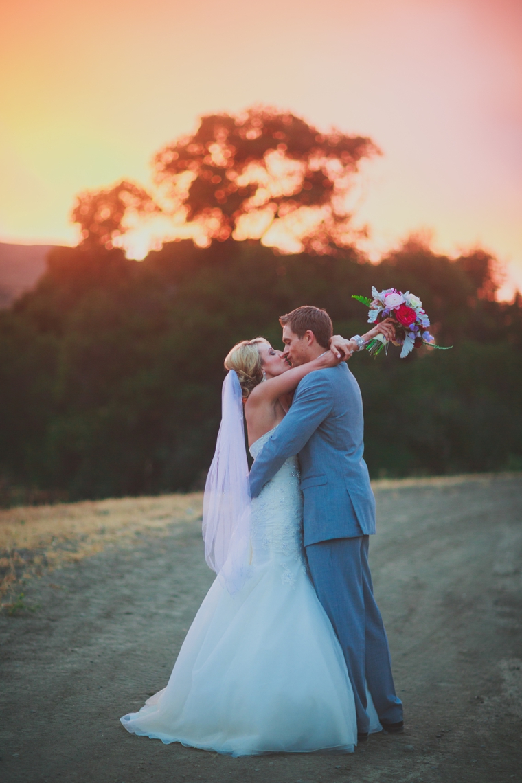 A Plum & Fuchsia California Vineyard Wedding via TheELD.com