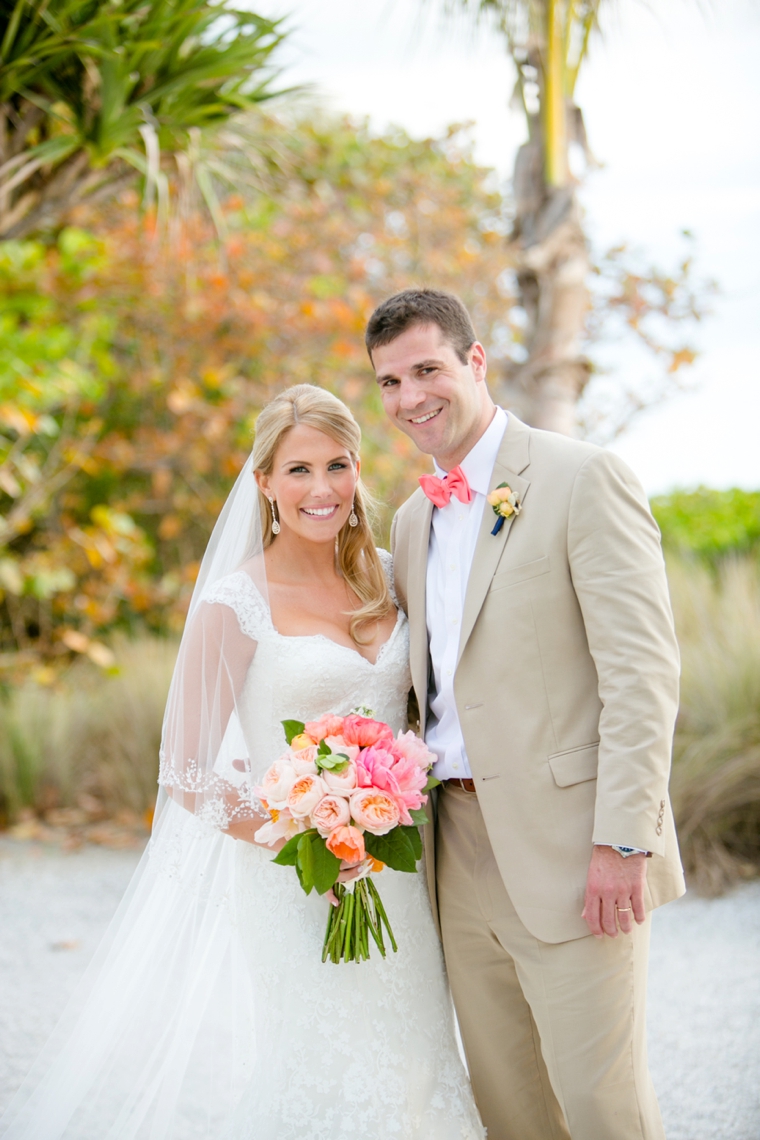 An Elegant Navy and Coral Wedding via TheELD.com