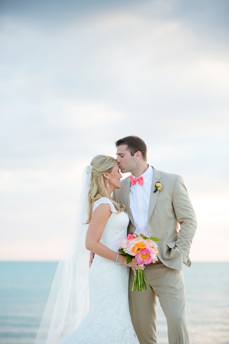 An Elegant Navy and Coral Wedding via TheELD.com