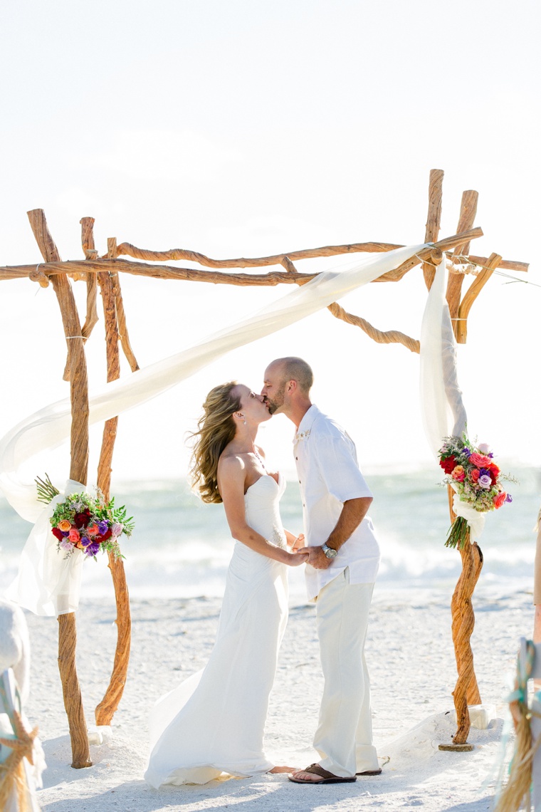 Fun & Eclectic Aqua Beach Wedding via TheELD.com