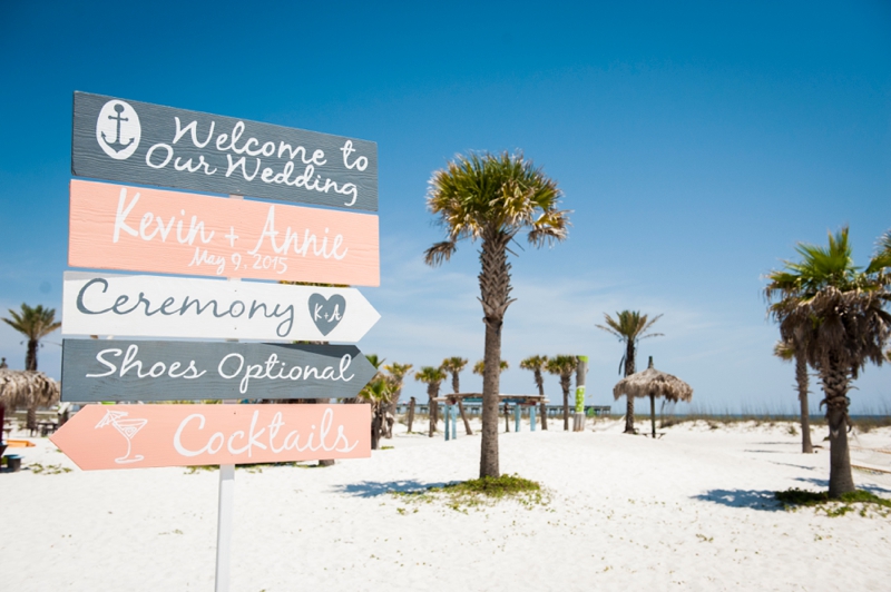 Coral and Aqua Beach Wedding via TheELD.com