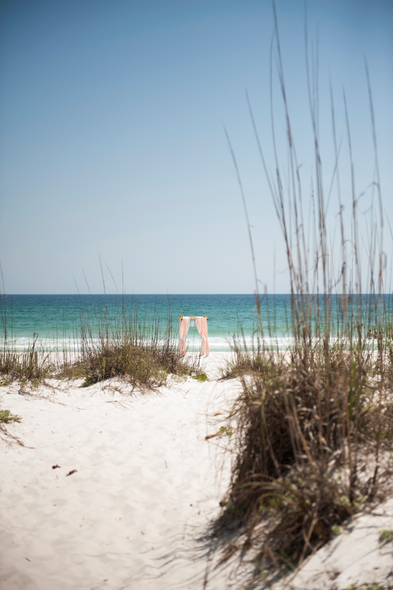 Coral and Aqua Beach Wedding via TheELD.com