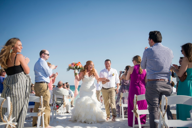 Coral and Aqua Beach Wedding via TheELD.com