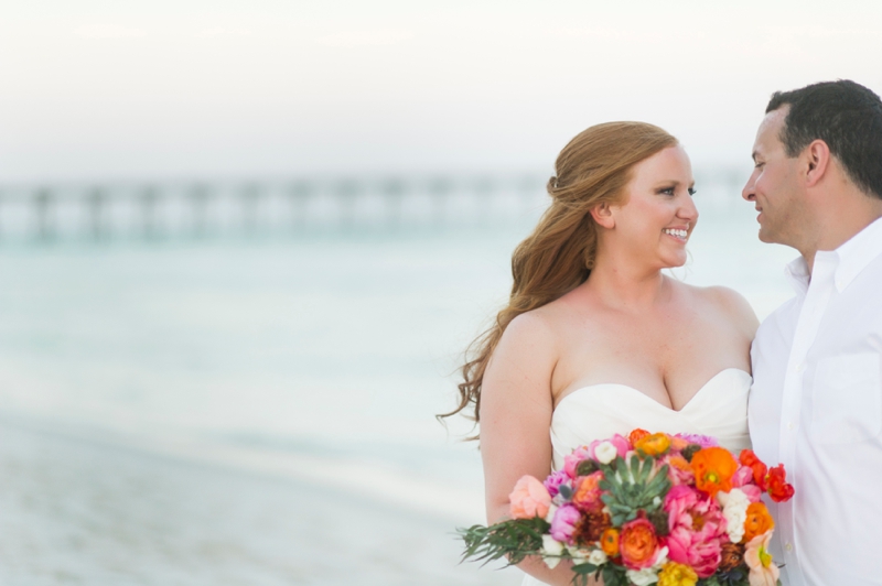 Coral and Aqua Beach Wedding via TheELD.com