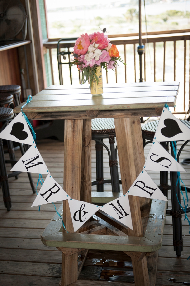 Coral and Aqua Beach Wedding via TheELD.com