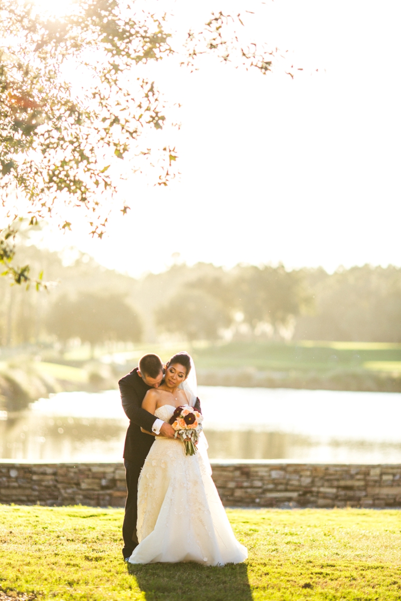 A Candlelit Red & Gold Jacksonville Wedding via TheELD.com