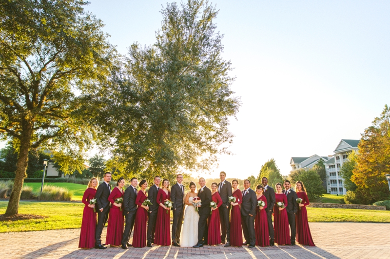 A Candlelit Red & Gold Jacksonville Wedding via TheELD.com