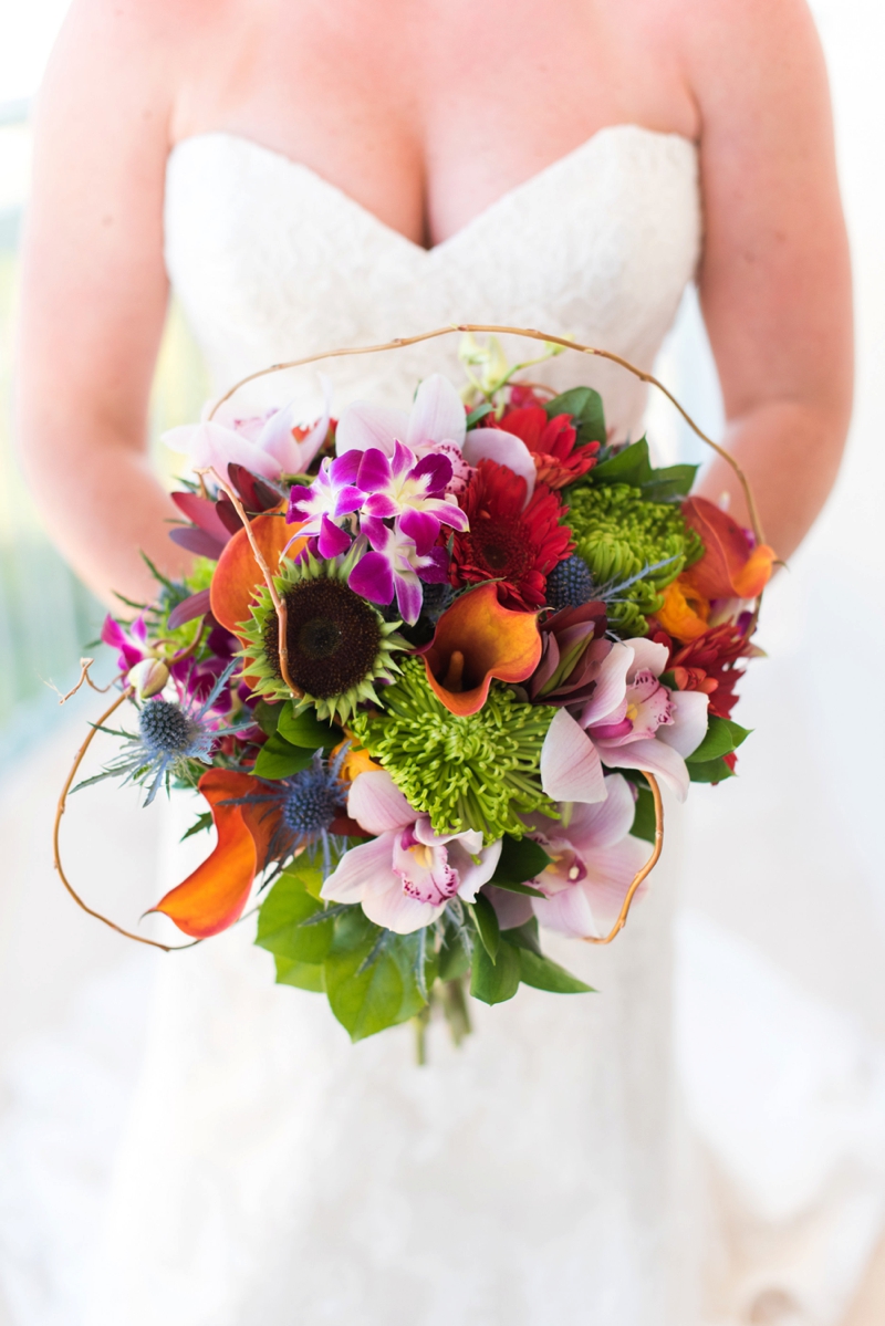 A Colorful & Tropical Beach Wedding via TheELD.com