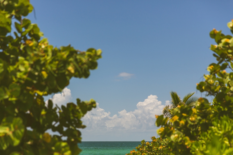 Aqua & White Oceanside Florida Wedding via TheELD.com