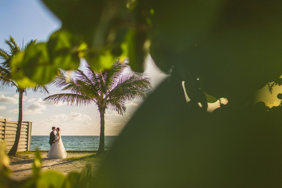Aqua & White Oceanside Florida Wedding via TheELD.com
