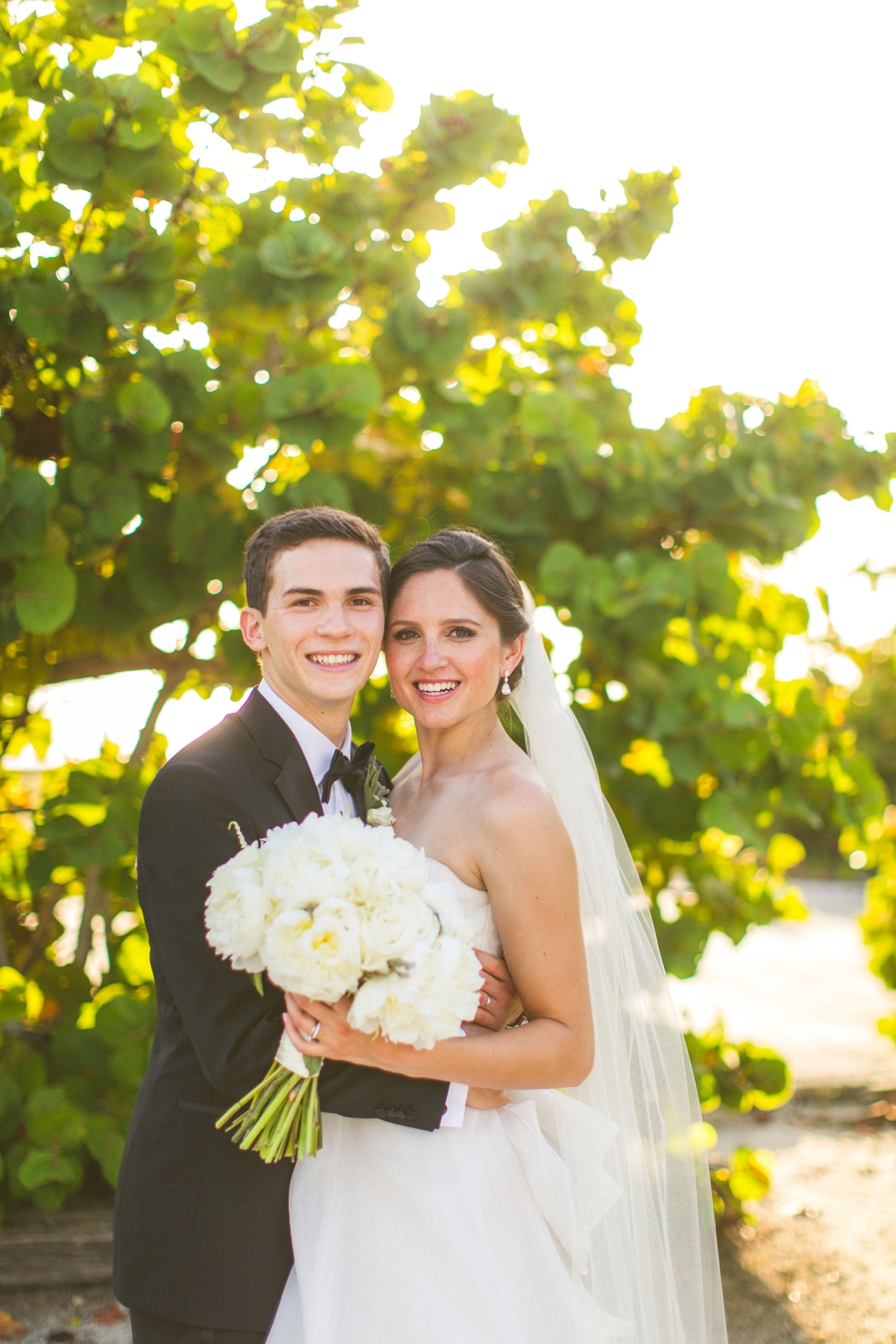 Aqua & White Oceanside Florida Wedding via TheELD.com