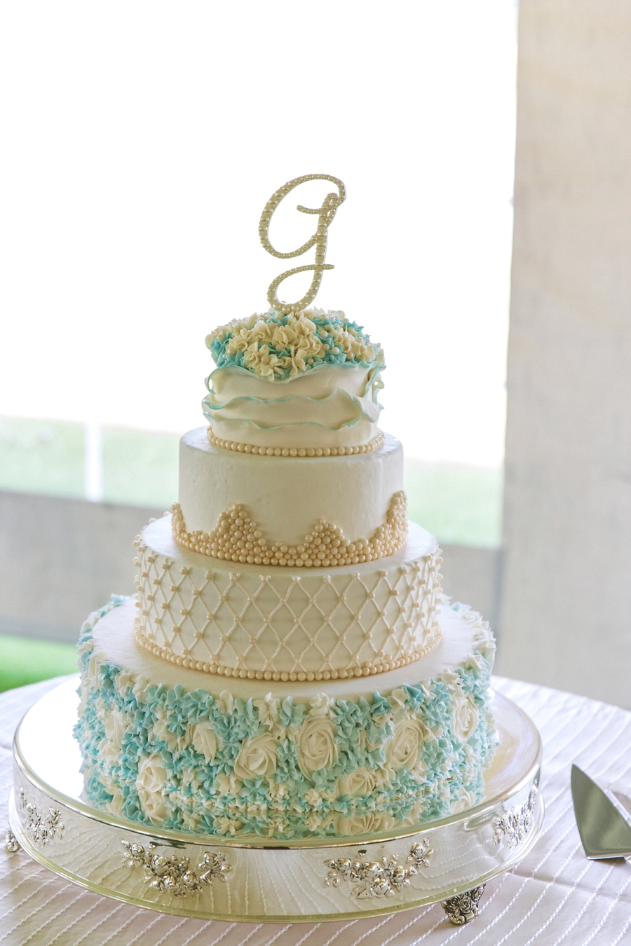 Aqua & White Oceanside Florida Wedding via TheELD.com