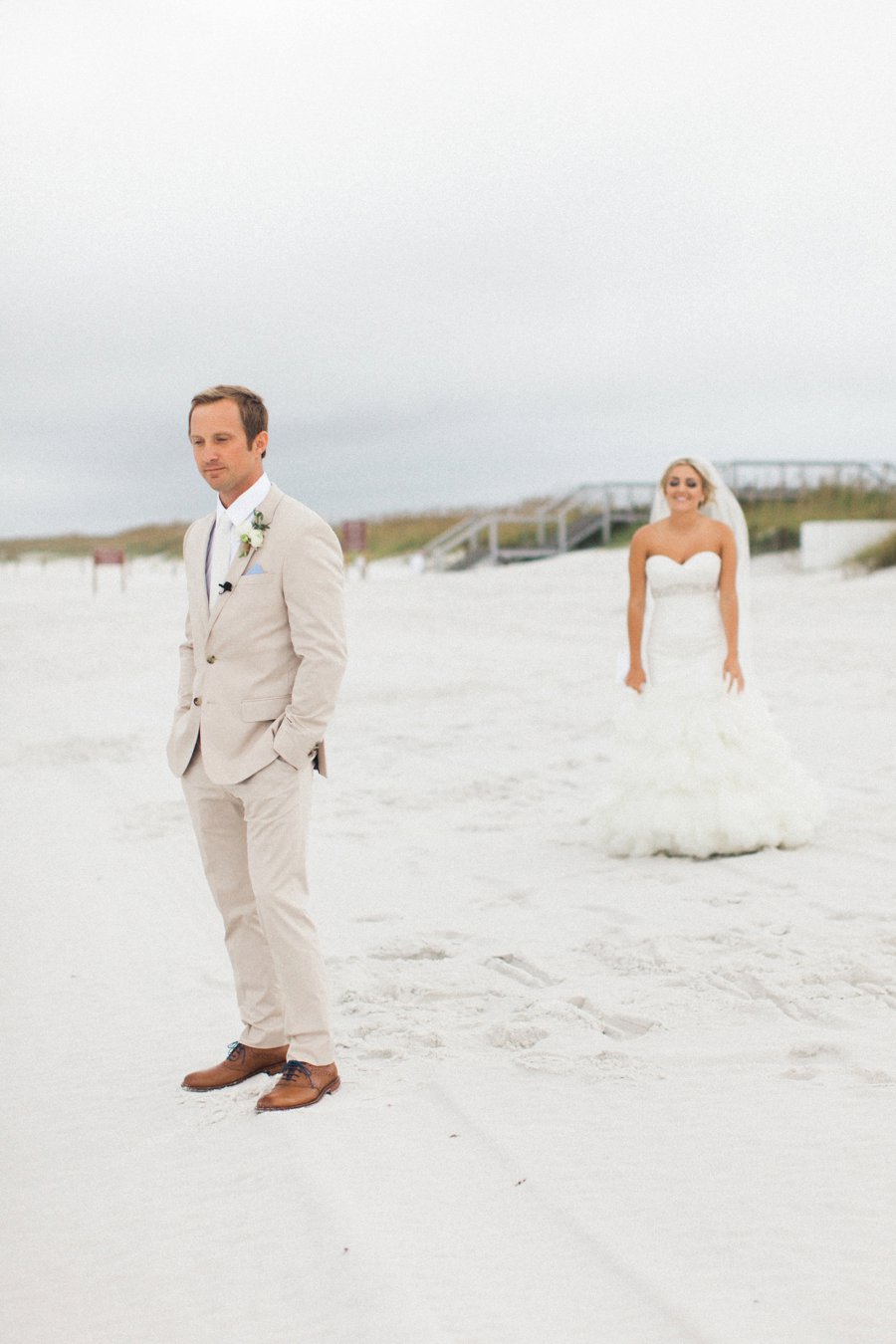 Elegant Blush & White Beach Wedding via TheELD.com