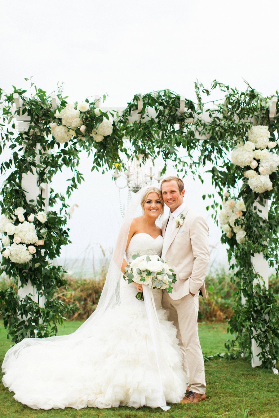 Elegant Blush & White Beach Wedding via TheELD.com