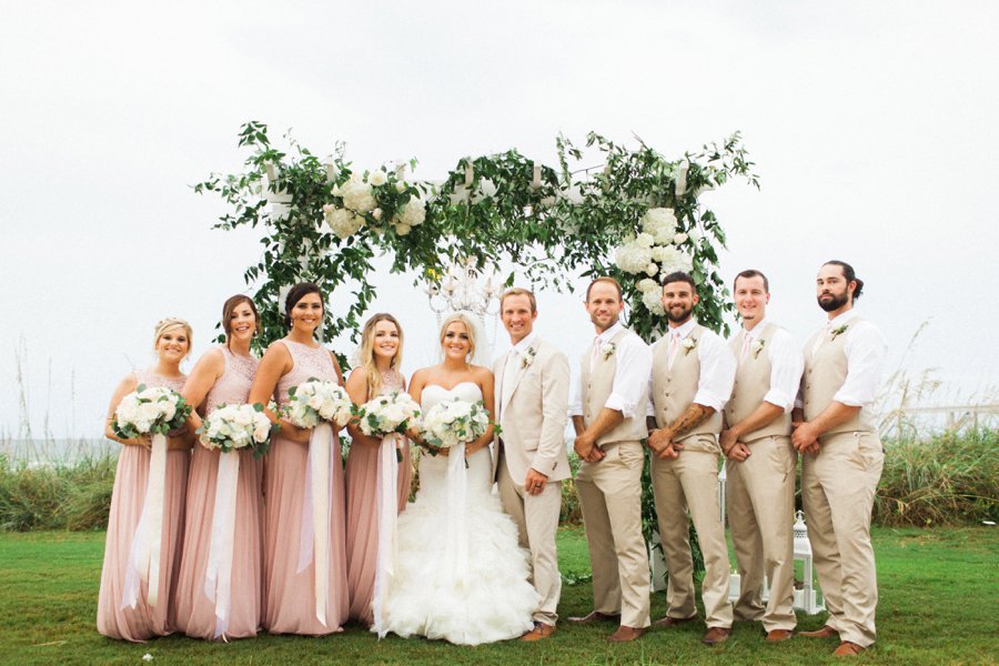 Elegant Blush & White Beach Wedding via TheELD.com