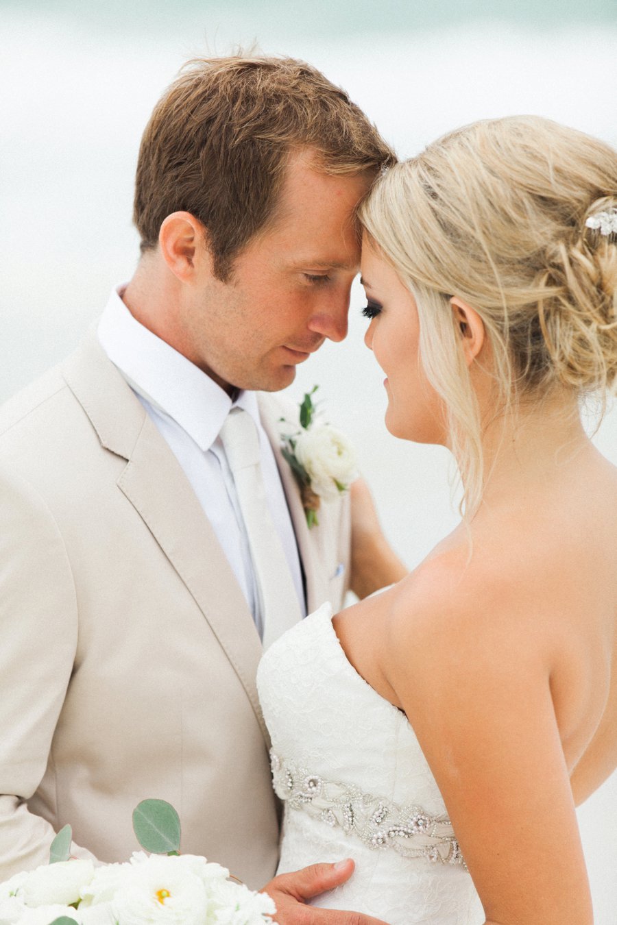 Elegant Blush & White Beach Wedding via TheELD.com