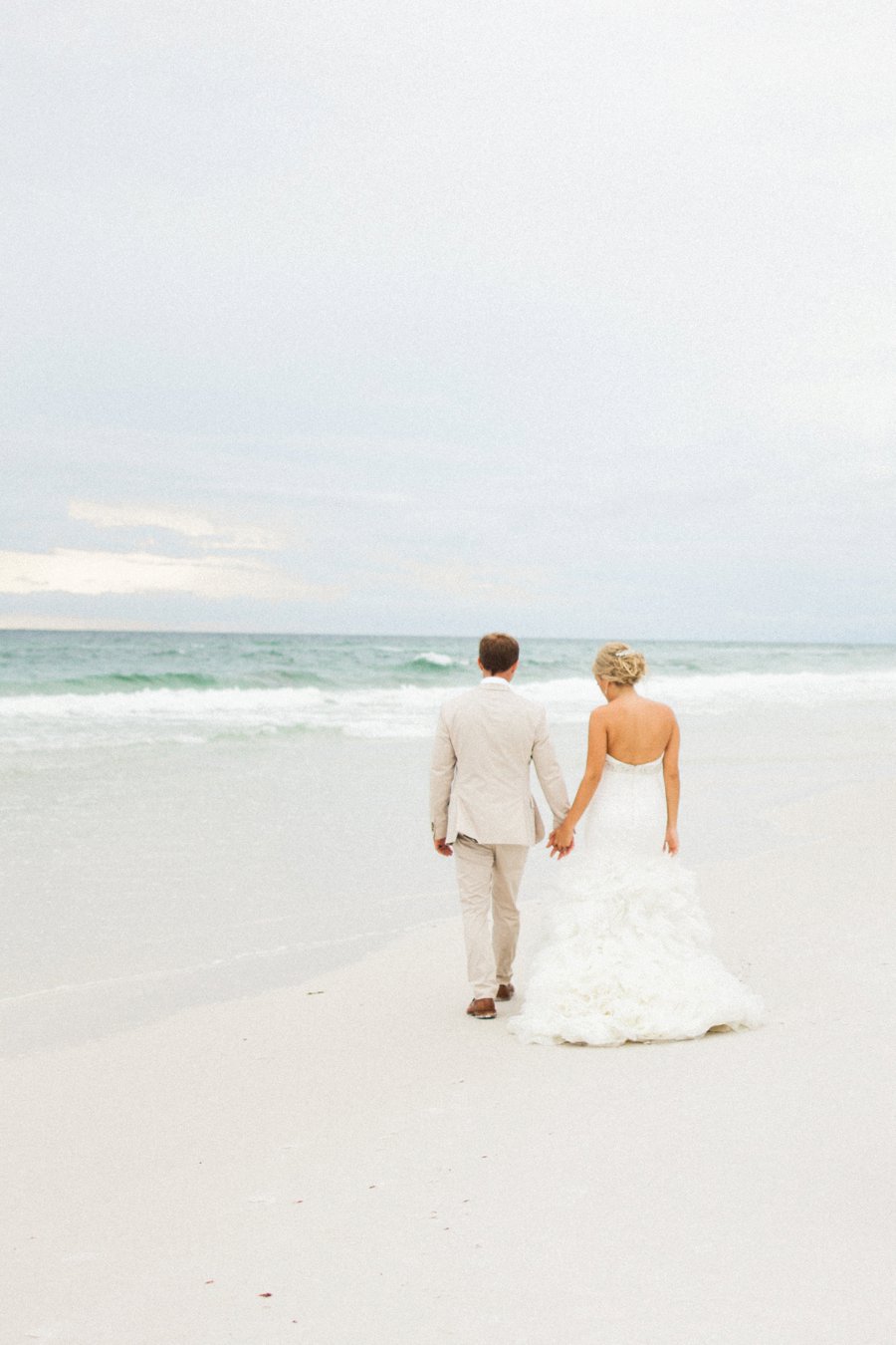 Elegant Blush & White Beach Wedding via TheELD.com