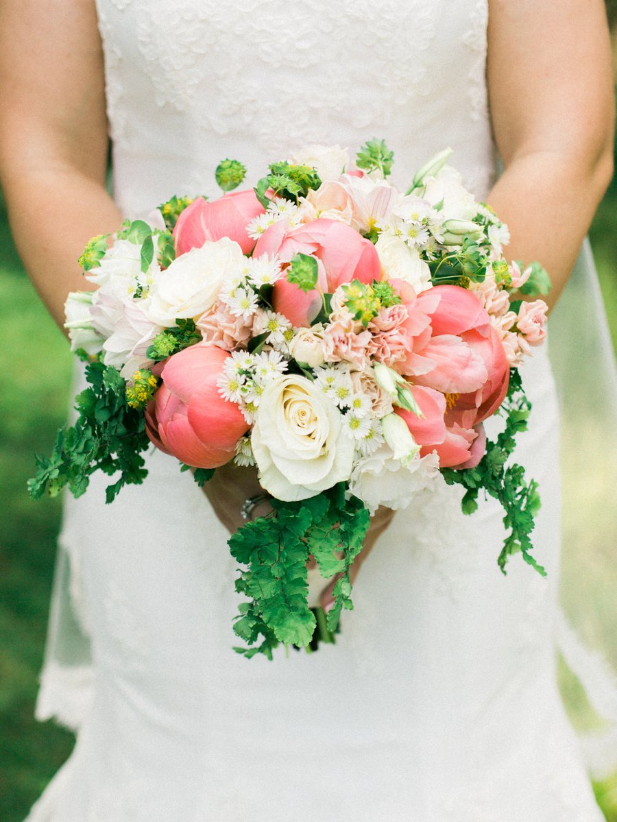 Yellow and Coral North Carolina Garden Wedding via TheELD.com