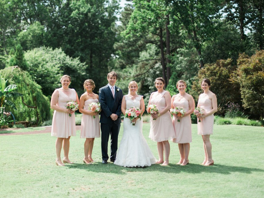 Yellow and Coral North Carolina Garden Wedding via TheELD.com