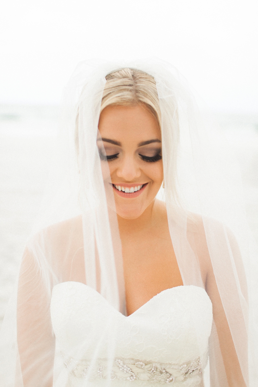 Elegant Blush & White Beach Wedding via TheELD.com