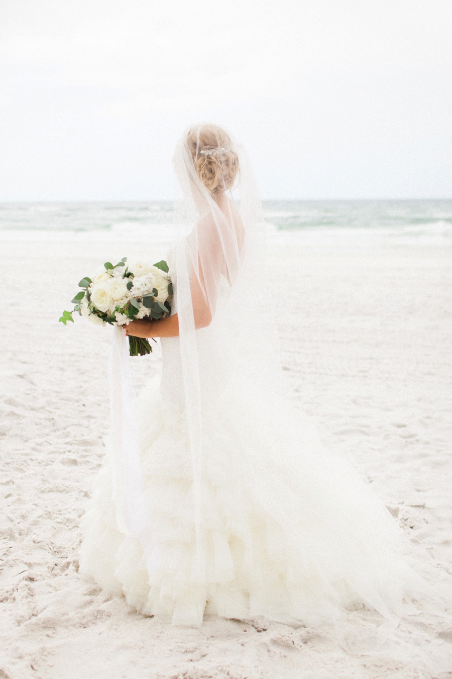 Elegant Blush & White Beach Wedding via TheELD.com