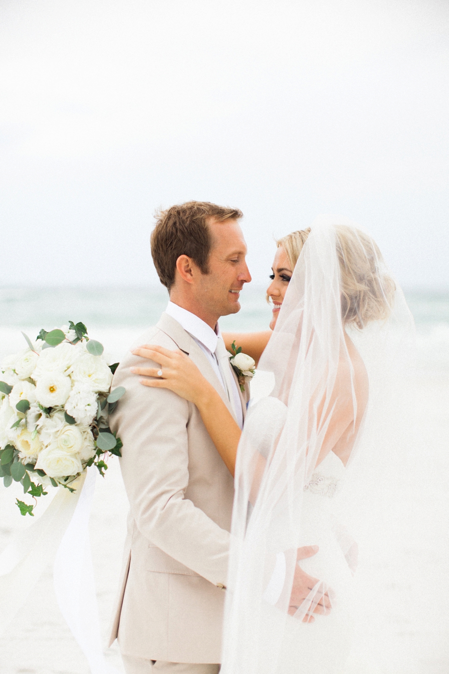 Elegant Blush & White Beach Wedding via TheELD.com