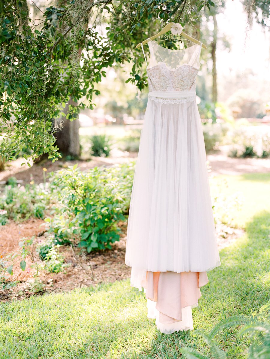 A Romantic Blush and White Rustic Florida Barn Wedding via TheELD.com