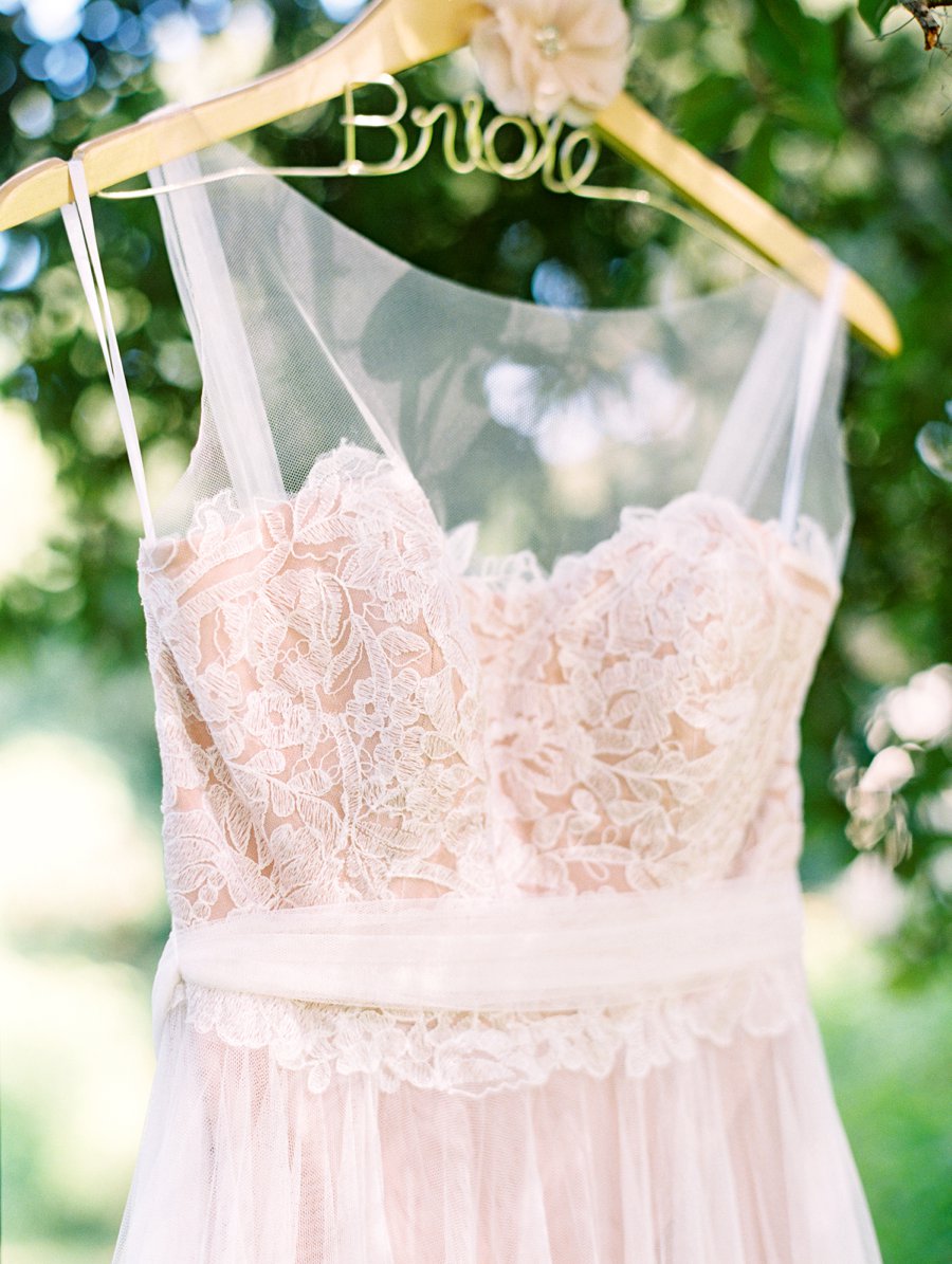 A Romantic Blush and White Rustic Florida Barn Wedding via TheELD.com