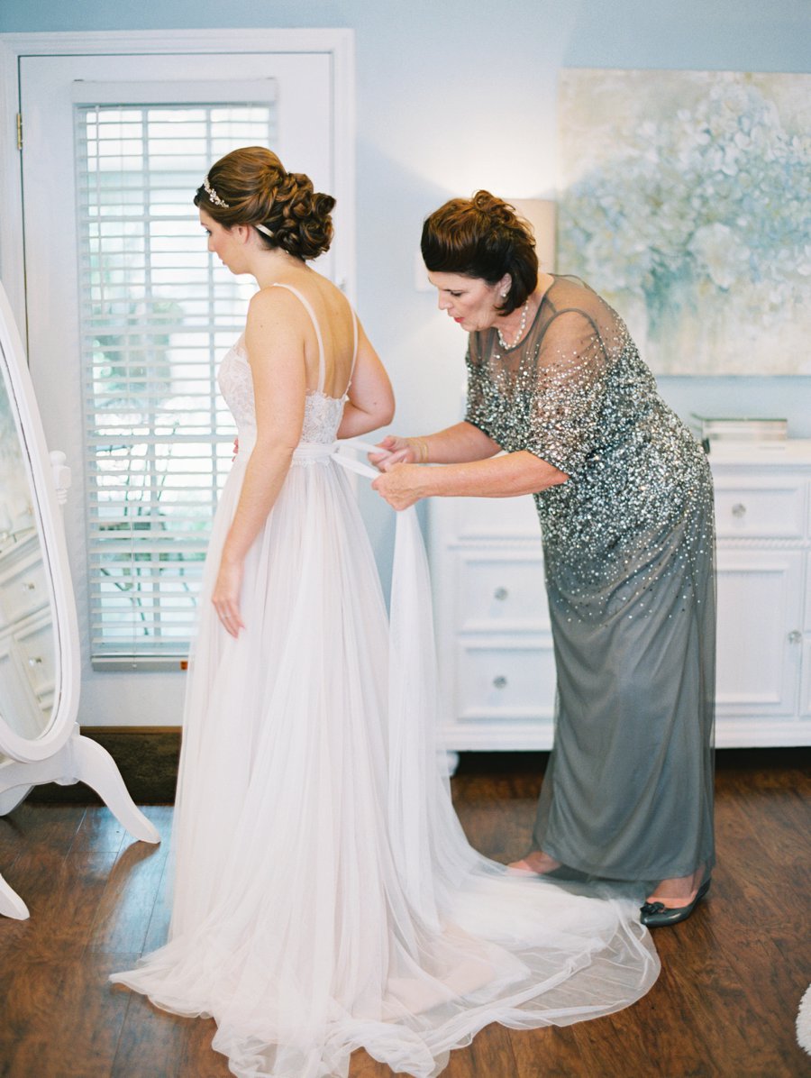 A Romantic Blush and White Rustic Florida Barn Wedding via TheELD.com