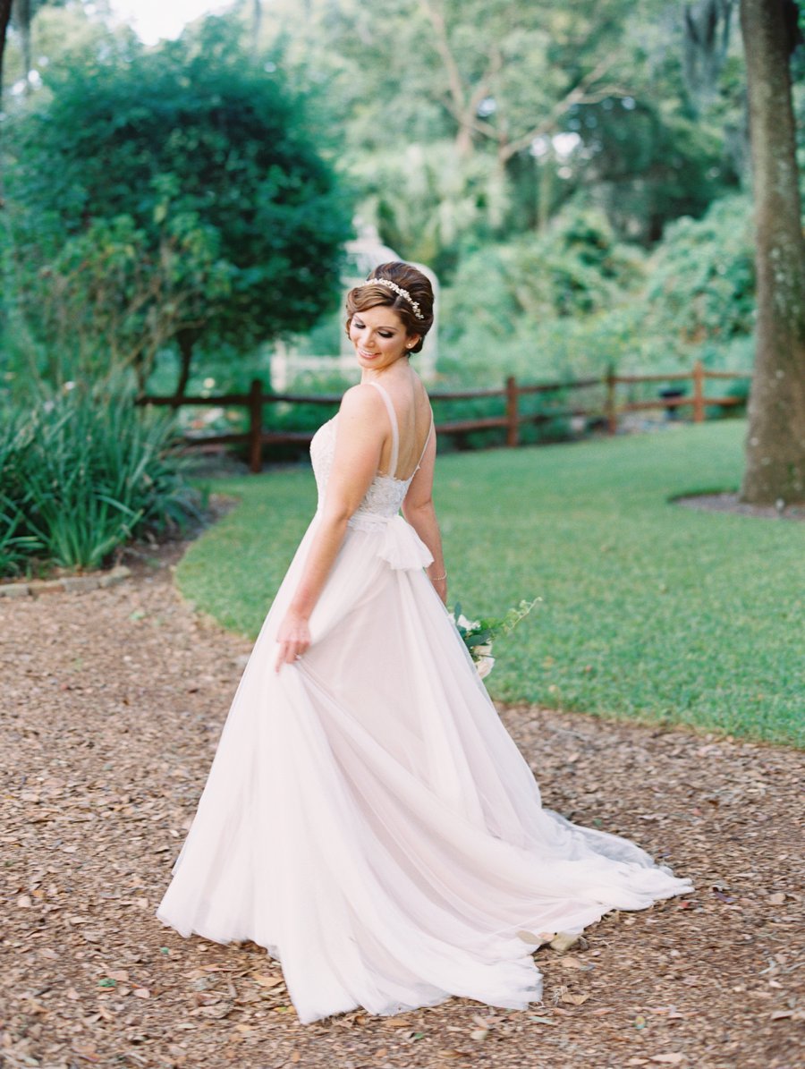 A Romantic Blush and White Rustic Florida Barn Wedding via TheELD.com