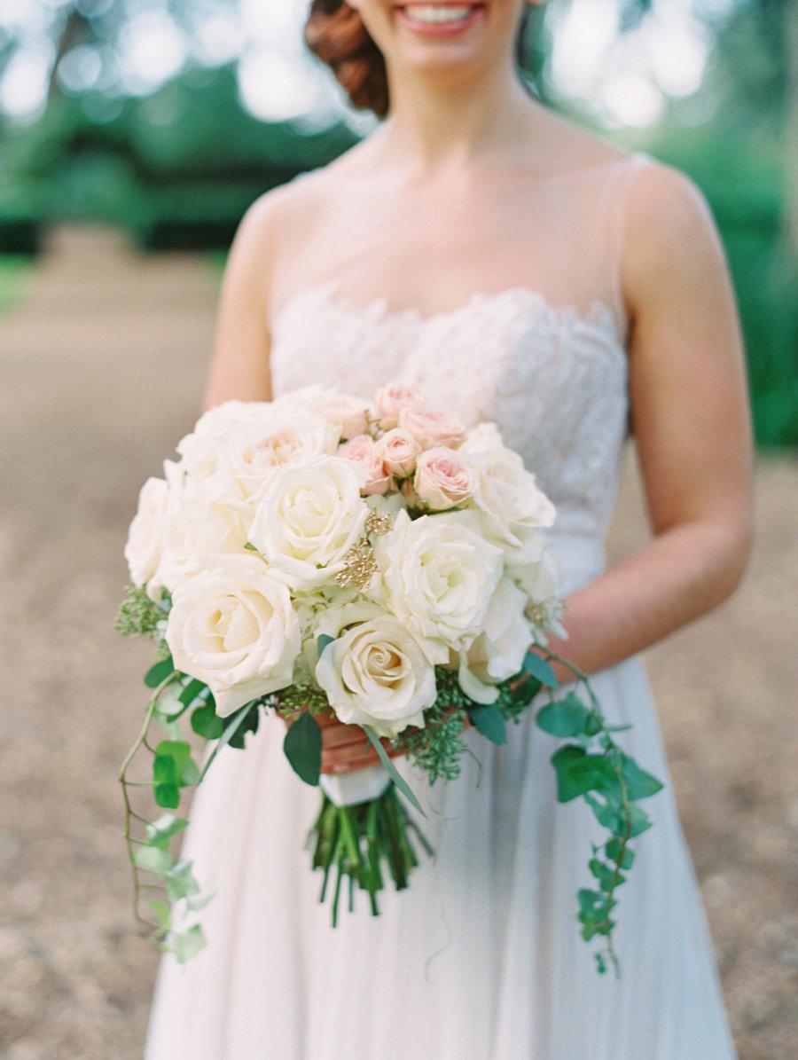 A Romantic Blush and White Rustic Florida Barn Wedding via TheELD.com