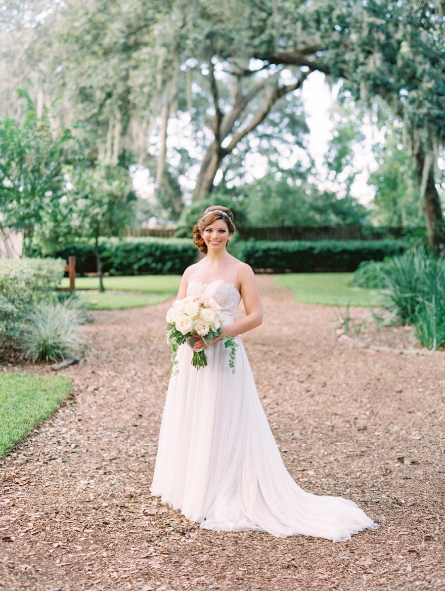 A Romantic Blush and White Rustic Florida Barn Wedding via TheELD.com