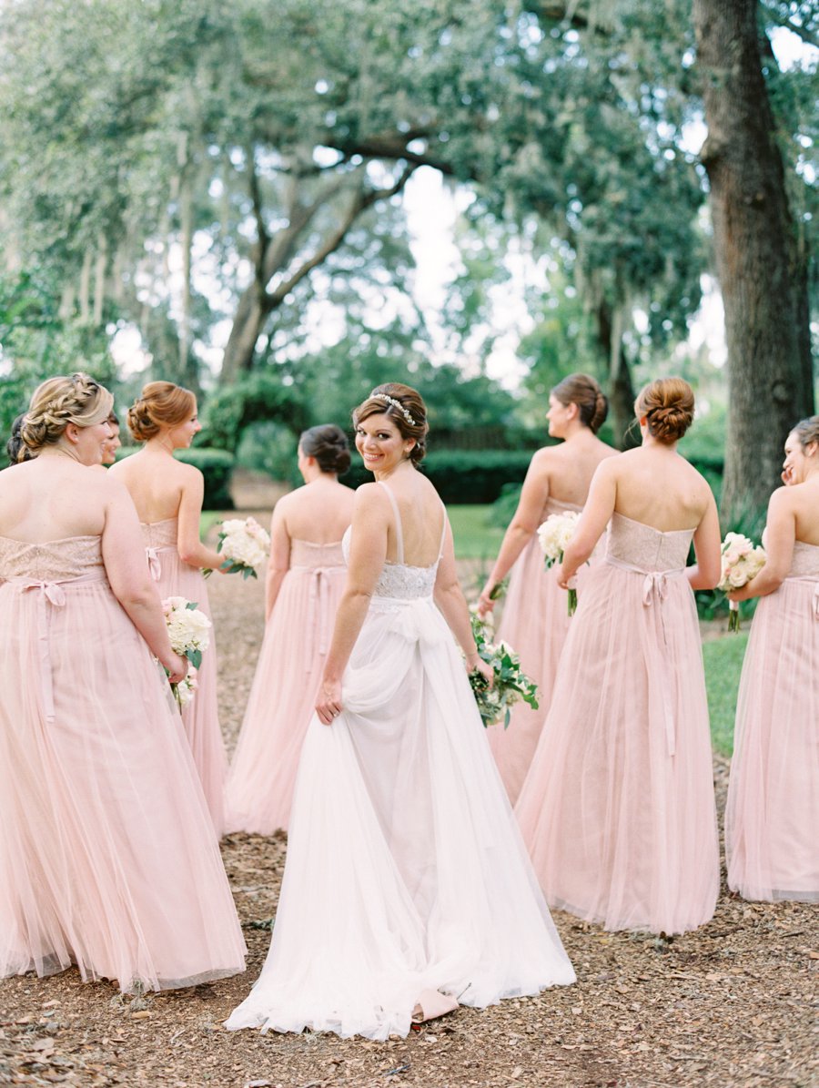 A Romantic Blush and White Rustic Florida Barn Wedding via TheELD.com