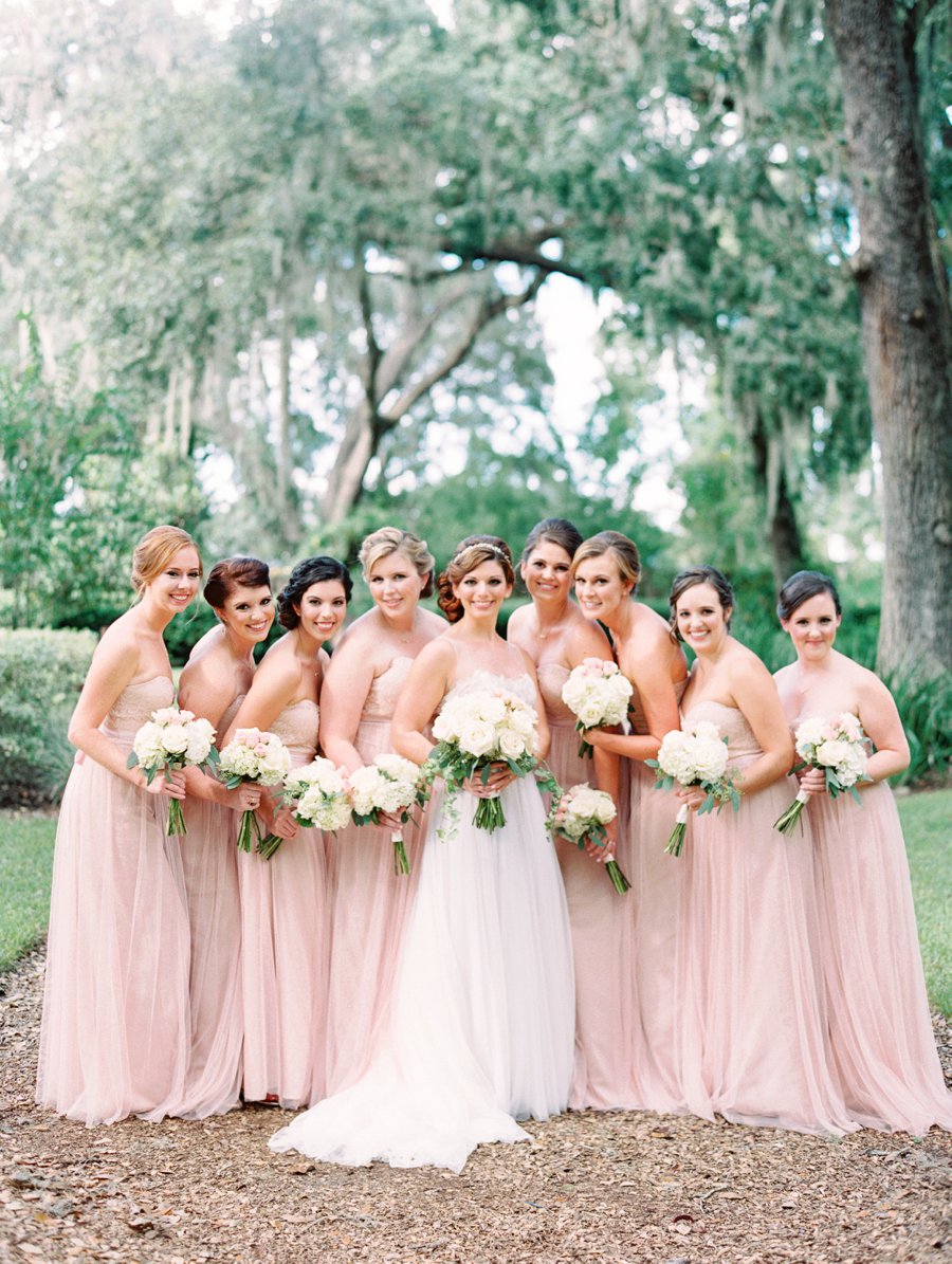 A Romantic Blush and White Rustic Florida Barn Wedding via TheELD.com