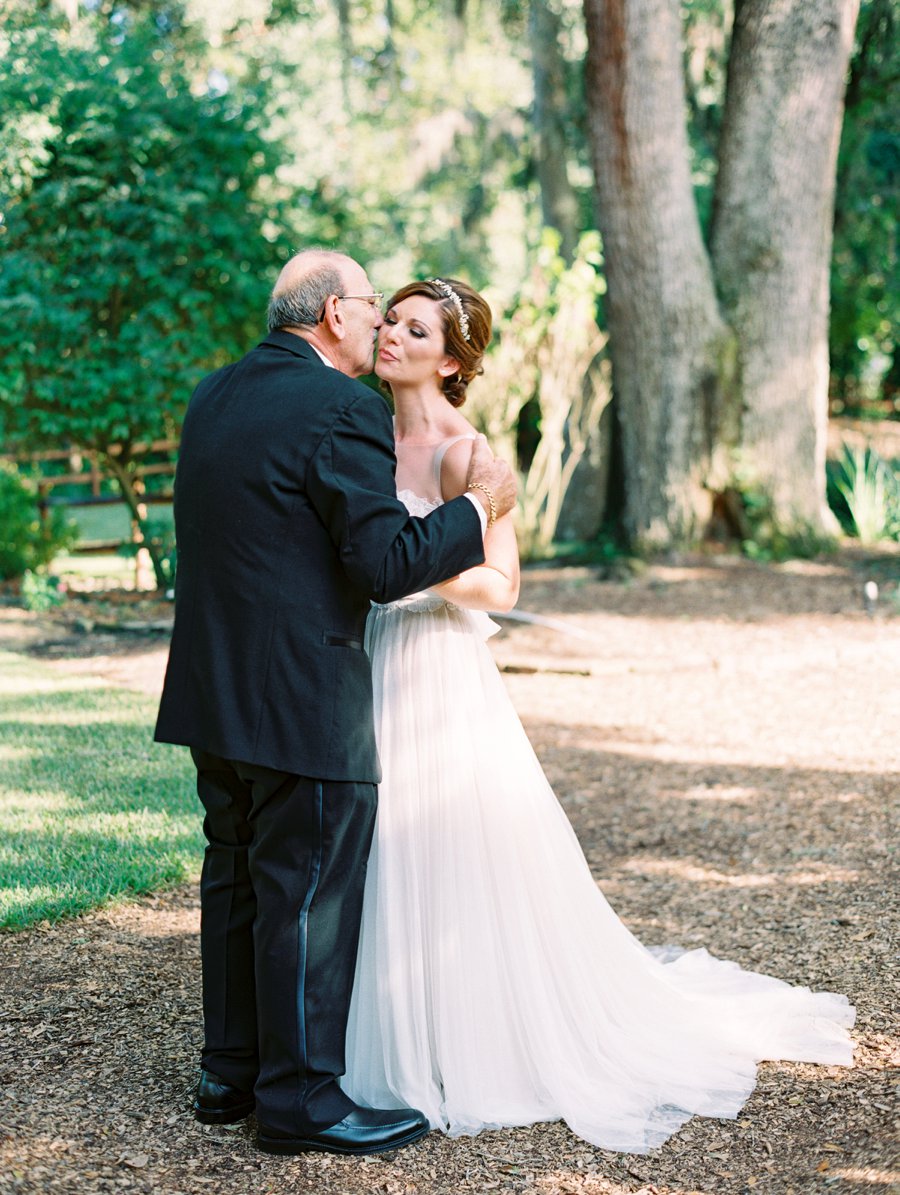 A Romantic Blush and White Rustic Florida Barn Wedding via TheELD.com