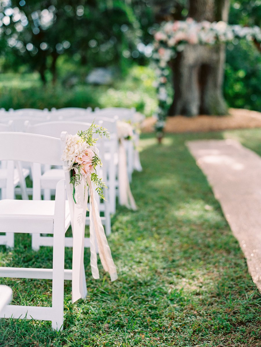 A Romantic Blush and White Rustic Florida Barn Wedding via TheELD.com