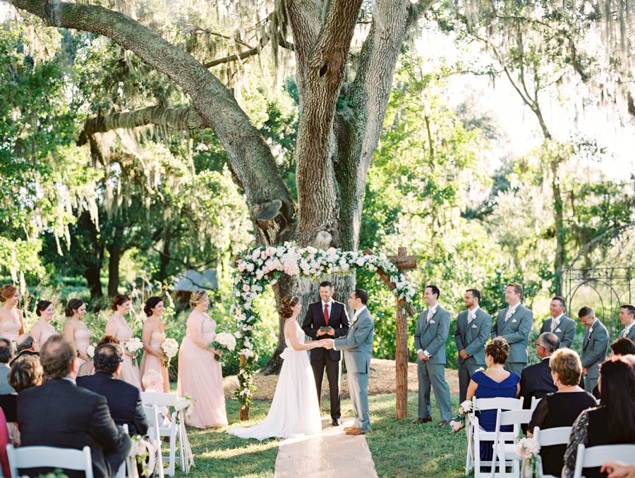 A Romantic Blush and White Rustic Florida Barn Wedding via TheELD.com
