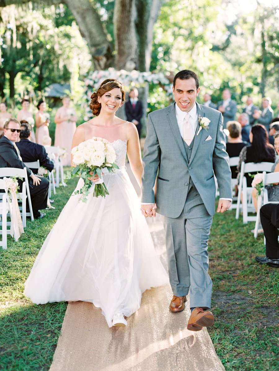 A Romantic Blush and White Rustic Florida Barn Wedding via TheELD.com